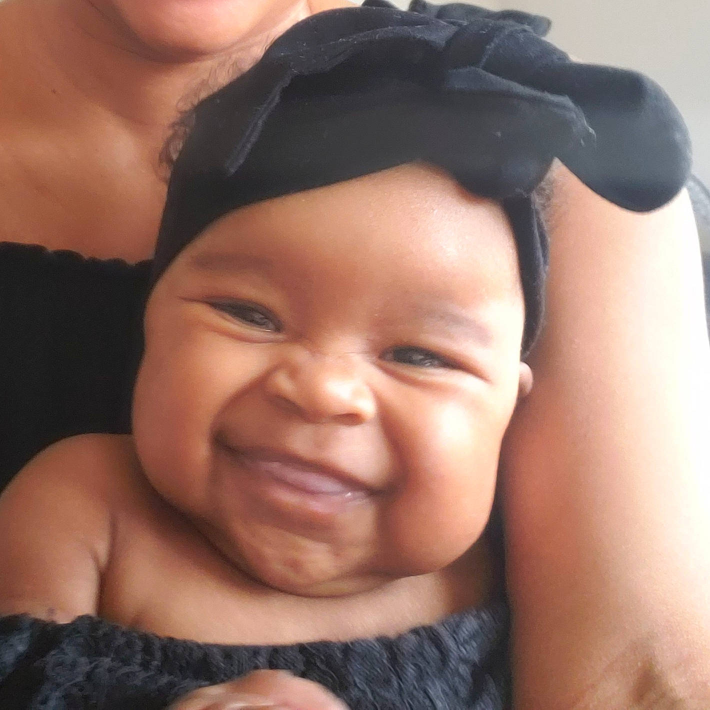 Nailah is registered to the contest to win money with this photo: black, cheek, chin, ear, eyebrow, eyelash, finger, forehead, gesture, happy, headwear, interaction, joy, lip, mouth, muscle, neck, nose, person, photograph