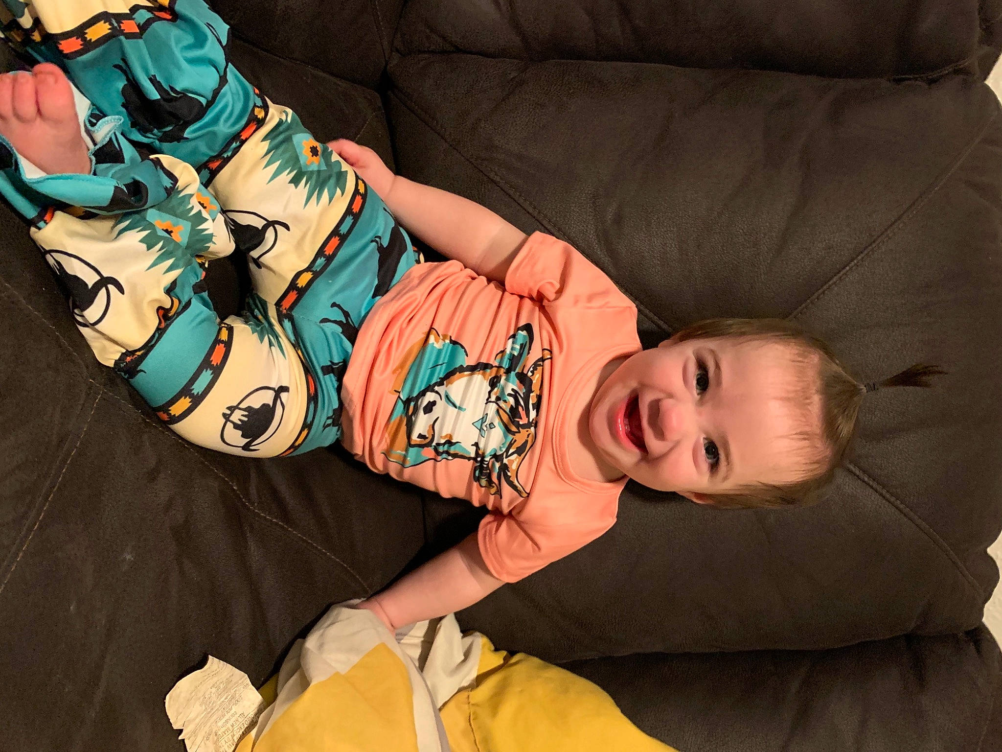 Izabella is registered to the contest to win money with this photo: baby, baby_toddler_clothing, child, comfort, couch, elbow, fictional_character, fun, hairstyle, hat, head, human_leg, pattern, person, sitting, sleeve, textile, thigh, toddler, vintage_clothing