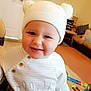 Cody-george is registered to the contest to win money with this photo: architecture, baby, beanie, bodypart, bonnet, building, cap, clothing, face, finger, furniture, happy, hat, head, indoors, livingroom, person, photography, portrait, room