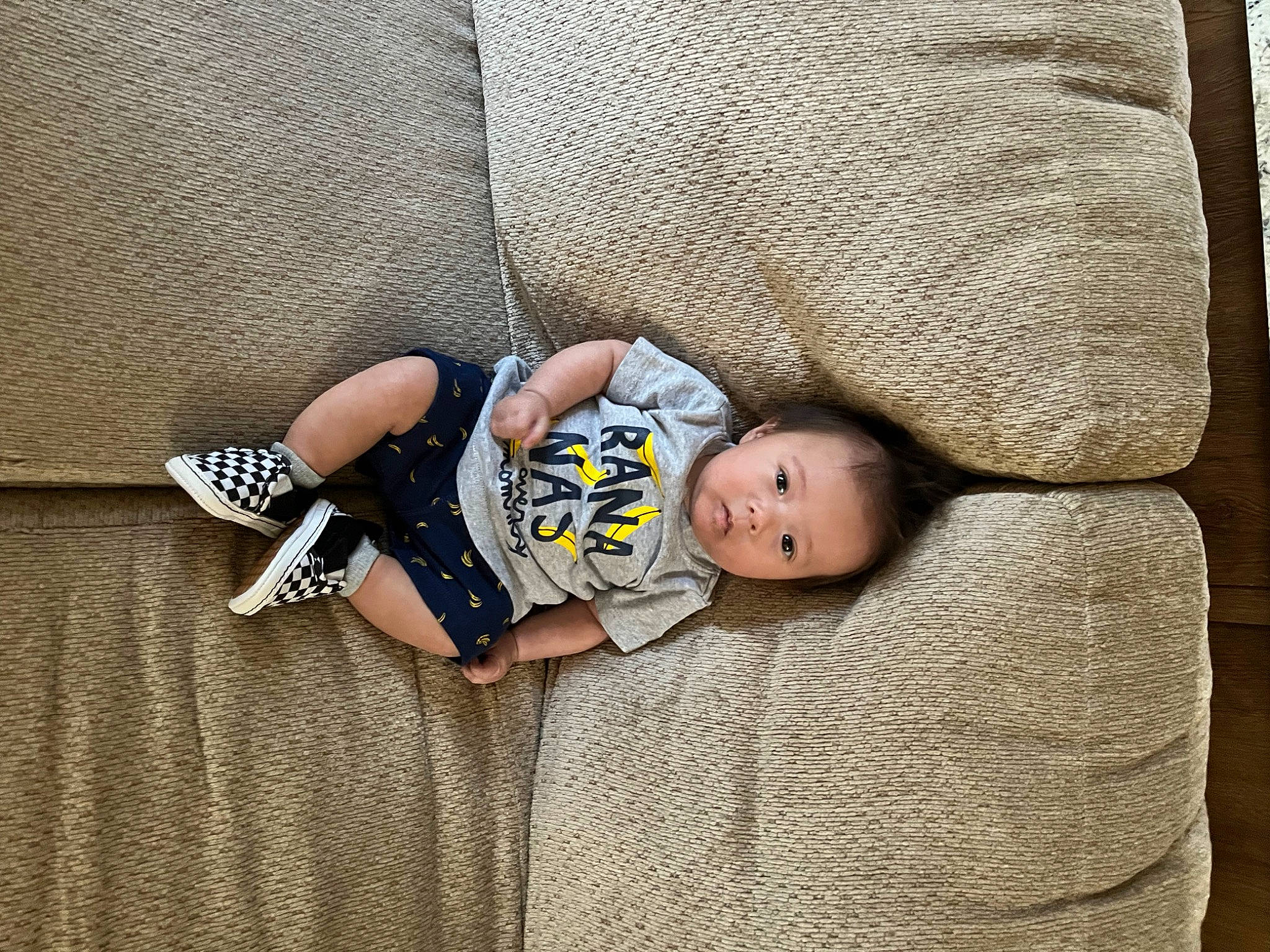 Kashton joined the competition — help win amazing prizes! arm, baby, baby_products, baby_sleeping, baby_toddler_clothing, comfort, couch, eye, flooring, grey, head, headgear, human_body, leg, linens, pattern, person, sitting, toddler, tree