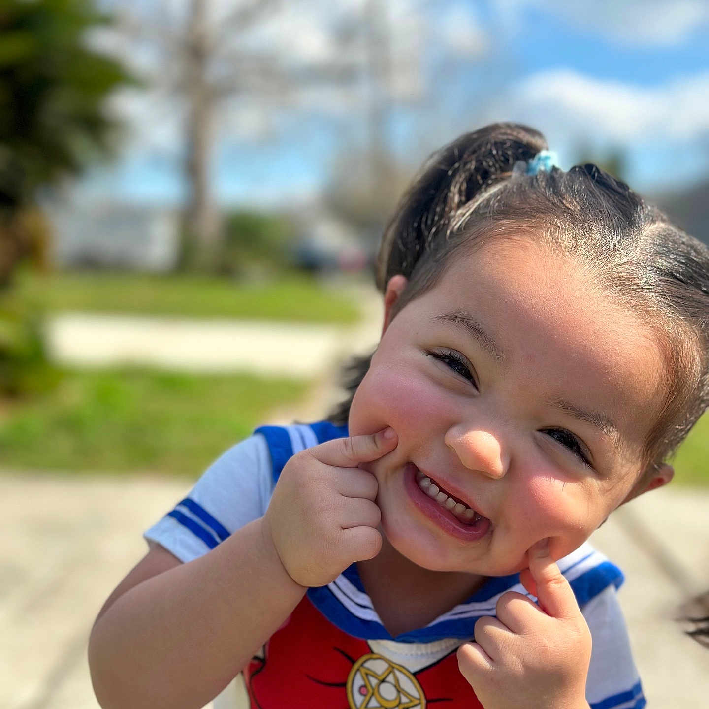 Willow Rose joined the competition — help win amazing prizes! baby, bodypart, clothing, face, finger, grass, hand, happy, head, laughing, mouth, outdoors, person, photography, plant, portrait, smile, t_shirt, teeth, tree