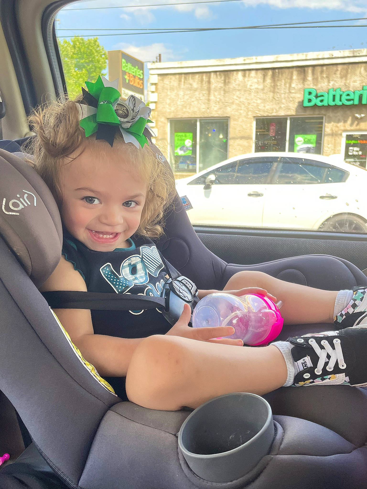 Amelia joined the competition — help win amazing prizes! auto_part, automotive_design, automotive_exterior, car, car_seat, clothing, facial_expression, hairstyle, happy, joy, motor_vehicle, people, person, smile, tableware, thigh, tire, toddler, vehicle, vehicle_door