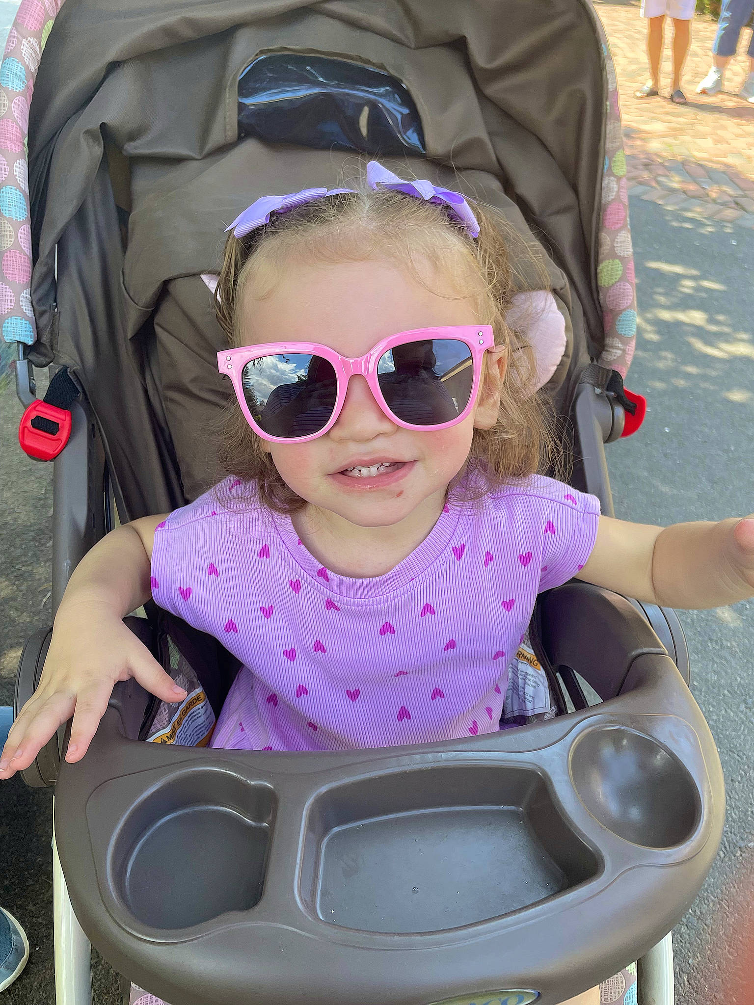 Amelia joined the competition — help win amazing prizes! baby_toddler_clothing, child, cool, eyewear, fun, glasses, goggles, leisure, magenta, mouth, person, personal_protective_equipment, photograph, pink, product, smile, snapshot, sunglasses, toddler, vision_care