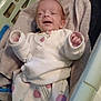 Mary participe au concours pour gagner de l'argent avec cette photo : baby, infant, smile, white_clothing, patterned_pants, towel, plastic_chair, cozy, indoor, happy, small_hands, cute, child, person, young, relaxed, portrait, seated, pink_pattern, soft_texture