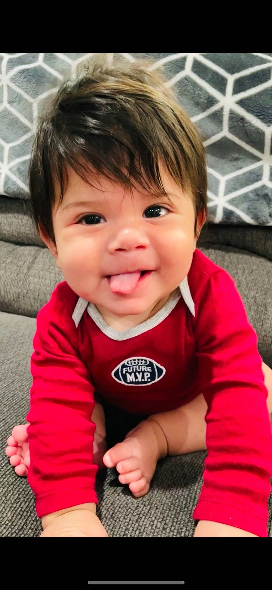 Emilio joined the competition — help win amazing prizes! baby, baby_toddler_clothing, cheek, chin, clothing, cool, eyebrow, eyelash, finger, gesture, grass, happy, joy, lip, nose, outerwear, person, pink, skin, sleeve