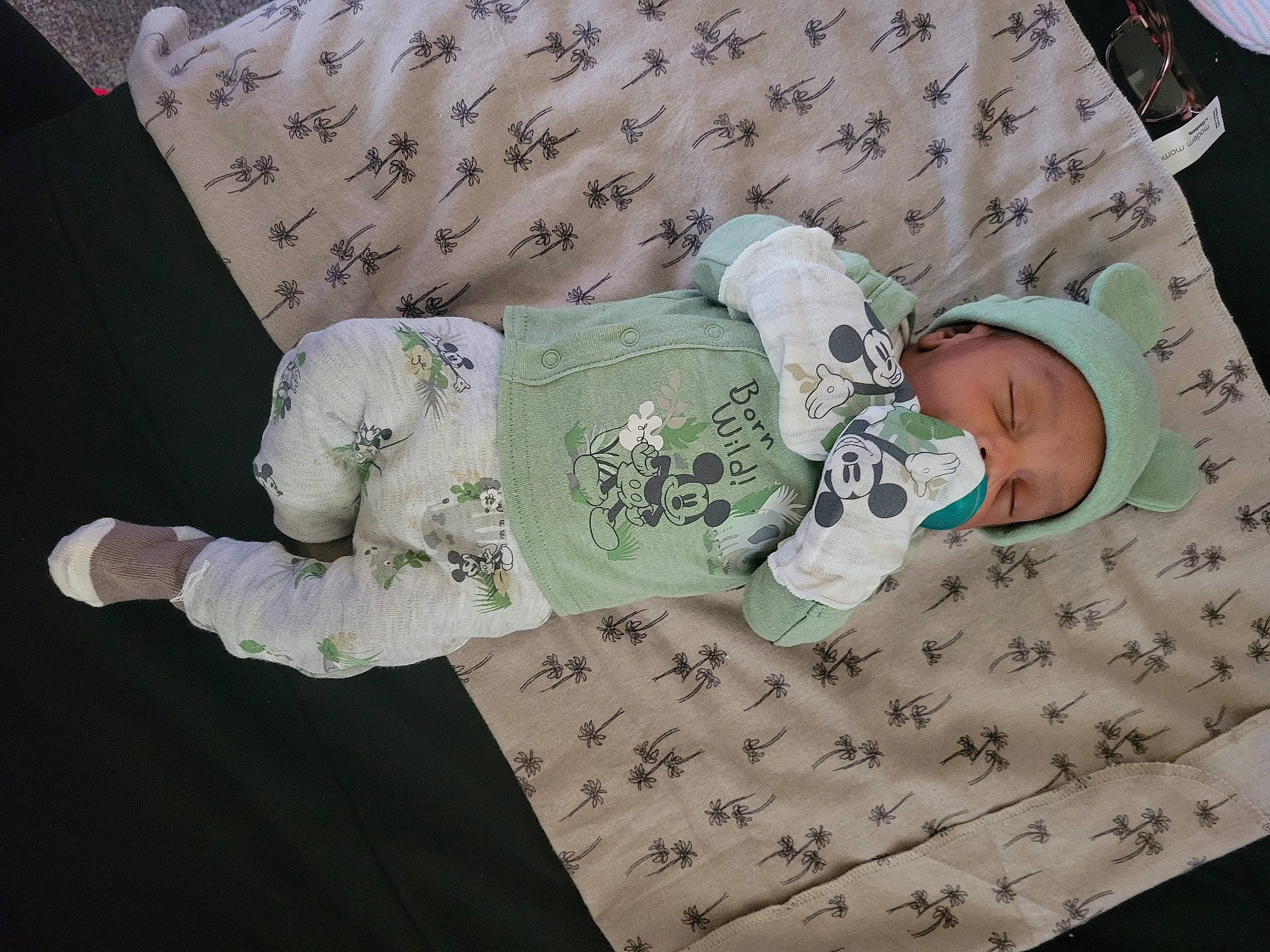 Prince is registered to the contest to win money with this photo: baby, baby_products, baby_safety, baby_sleeping, baby_toddler_clothing, child, comfort, linens, pattern, person, room, sitting, sleep, sleeve, toddler