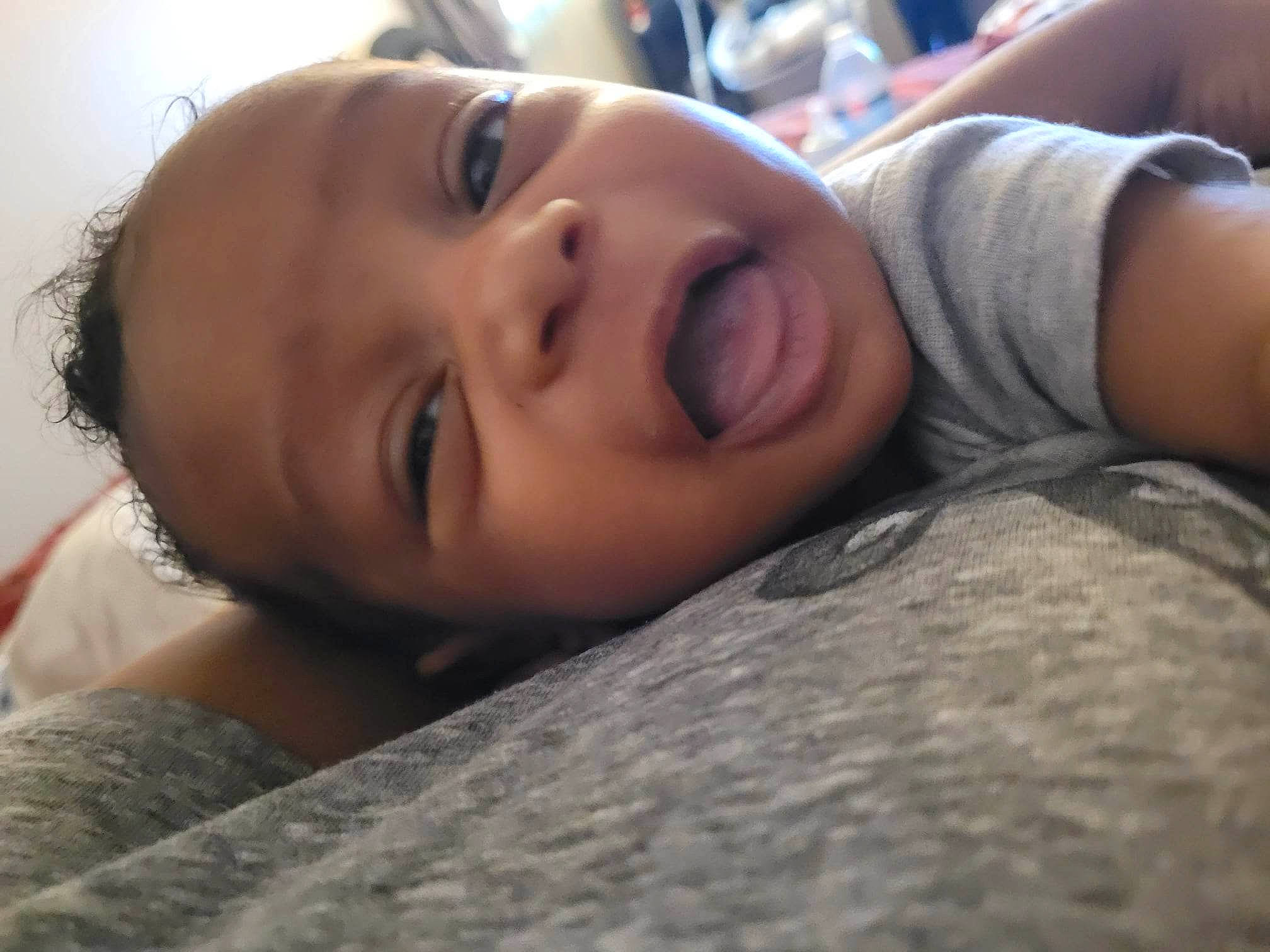 Prince joined the competition — help win amazing prizes! baby, cheek, child, comfort, eye, eyebrow, eyelash, forehead, fun, grass, happy, iris, linens, lip, mouth, nose, person, portrait_photography, skin, smile