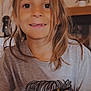 Malia participe au concours pour gagner de l'argent avec cette photo : child, smiling, missing_tooth, long_hair, gray_tshirt, sunflower, bandana, indoor, plant, potted_plant, home_decor, portrait, person, casual, young, face, happy, cute, light_brown_hair, childhood