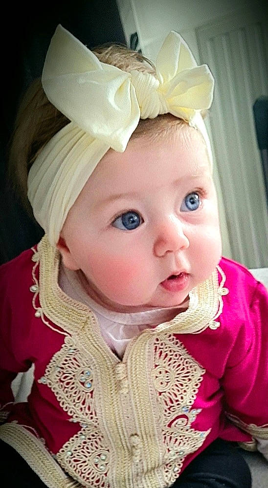 Zina a rejoint le concours — aidez-le/la à gagner de superbes lots ! baby, baby_toddler_clothing, cap, cheek, costume_hat, curtain, eyelash, fun, happy, hat, headband, headgear, headpiece, headwear, helmet, iris, lip, person, pink, sleeve