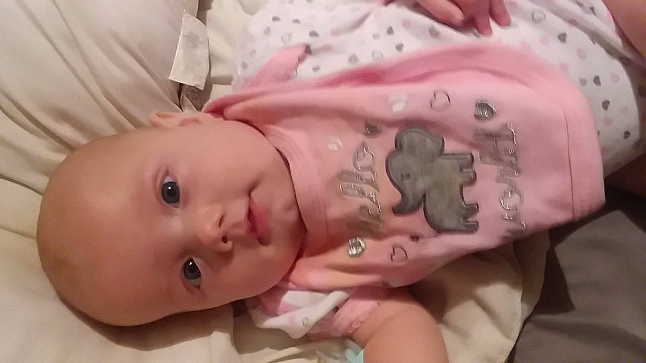 Saralynn is registered to the contest to win money with this photo: baby, cheek, child, eye, face, head, lip, mouth, nose, person, pink, skin, toddler