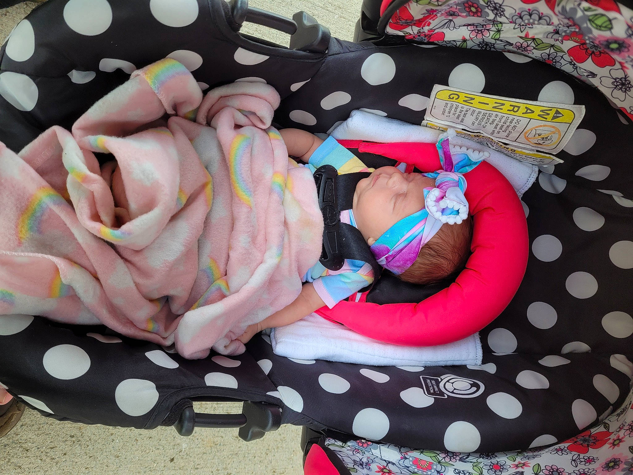 Joy is registered to the contest to win money with this photo: baby, baby_products, baby_toddler_clothing, child, comfort, fashion_accessory, fun, headwear, linens, magenta, nap, pattern, person, pink, polka_dot, swimwear, textile, thigh, toddler, white