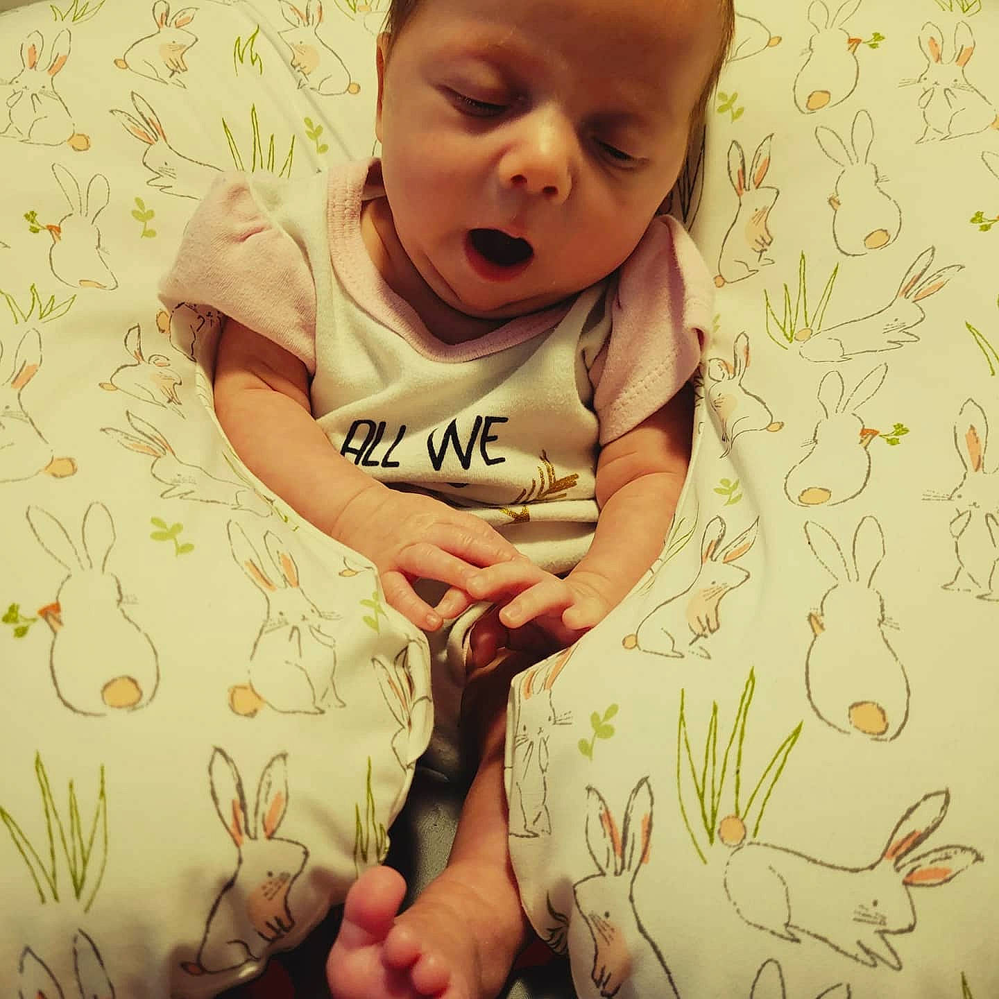 Joy is registered to the contest to win money with this photo: baby, baby_toddler_clothing, cheek, comfort, cool, eye, face, finger, gesture, hairstyle, happy, head, iris, nose, pattern, people_in_nature, person, skin, sleeve, textile