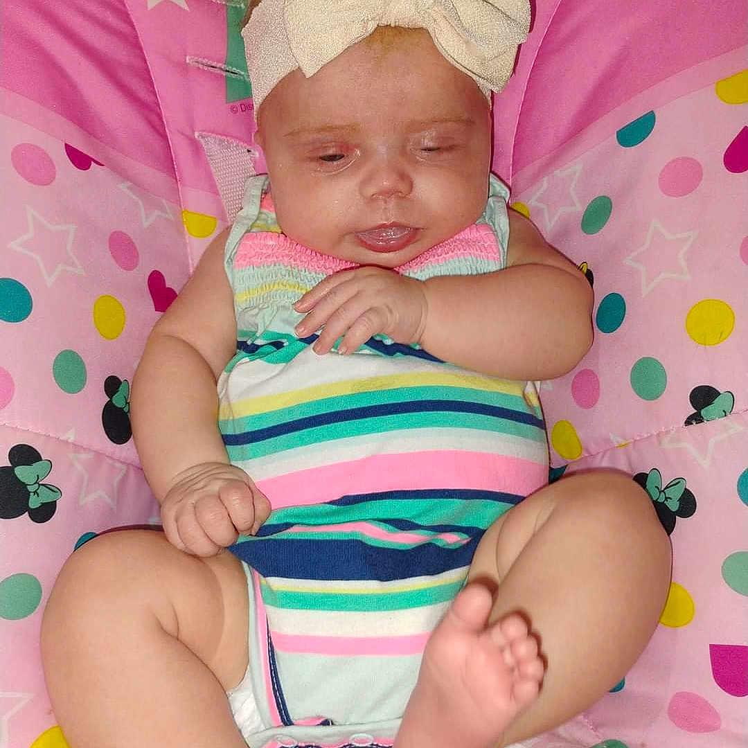 Skylar joined the competition — help win amazing prizes! baby, bed, bedroom, clothing, couch, cushion, diaper, face, furniture, hat, head, homedecor, indoors, newborn, person, photography, portrait, quilt, room, sleeping