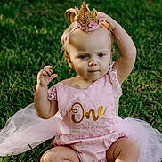 Skylar joined the competition — help win amazing prizes! baby, barefoot, birthday, celebration, child, crown, cute, girl, grass, headband, infant, nature, one_year, outdoor, pink_dress, portrait, sitting, sunlight, tutu, young_child