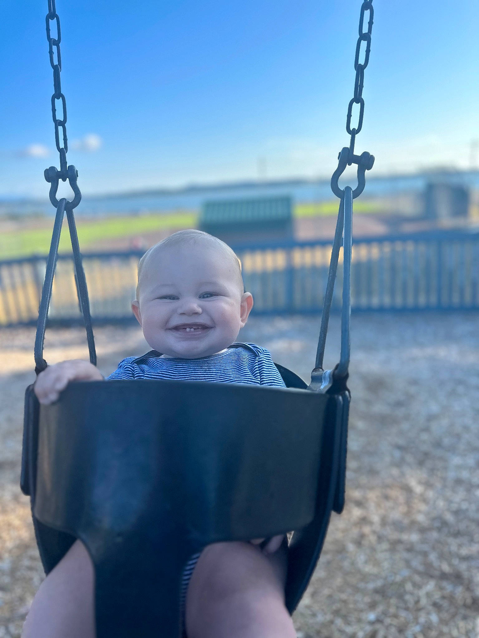 Axell is registered to the contest to win money with this photo: azure, baby, baby_toddler_clothing, beauty, child, city, electric_blue, eye, face, grass, happy, joy, leisure, person, photograph, recreation, sitting, sky, smile, swing