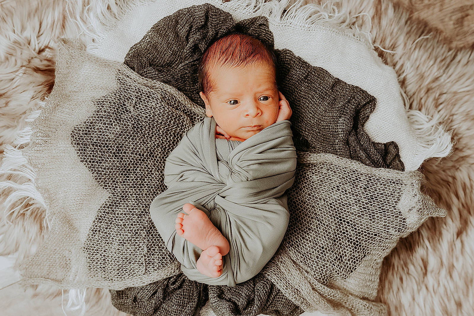Banks is registered to the contest to win money with this photo: baby, baby_toddler_clothing, cheek, child, comfort, fur, grass, happy, linens, monochrome, monochrome_photography, outerwear, pattern, person, portrait_photography, sitting, skin, sleeve, textile, toddler