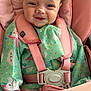 Amelia joined the competition — help win amazing prizes! baby, high_chair, bib, food, messy, face, smile, child, feeding, unicorn, pink, green, spoon, seatbelt, happy, cute, infant, clothing, indoor, portrait