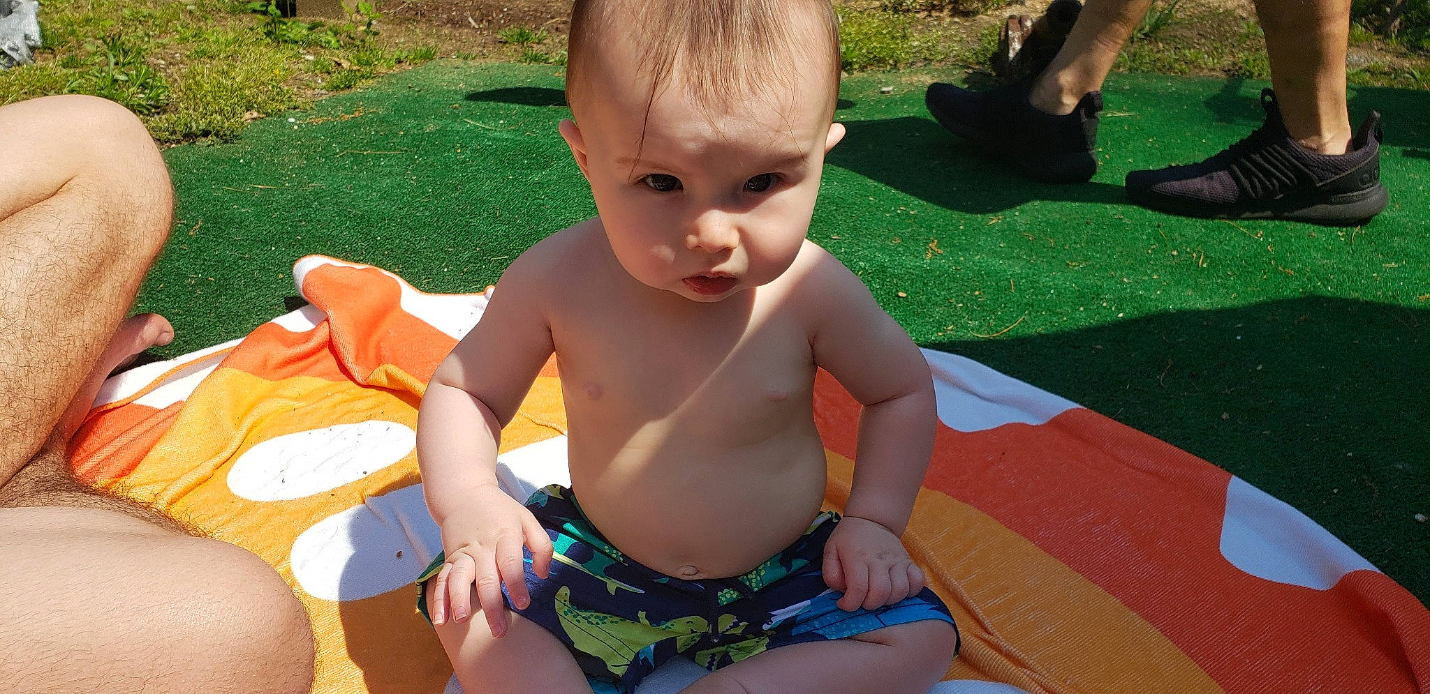 Jessie is registered to the contest to win money with this photo: baby, baby_toddler_clothing, chest, finger, fun, grass, green, happy, head, human_body, leisure, people_in_nature, person, plant, recreation, skin, summer, thigh, thumb, toddler
