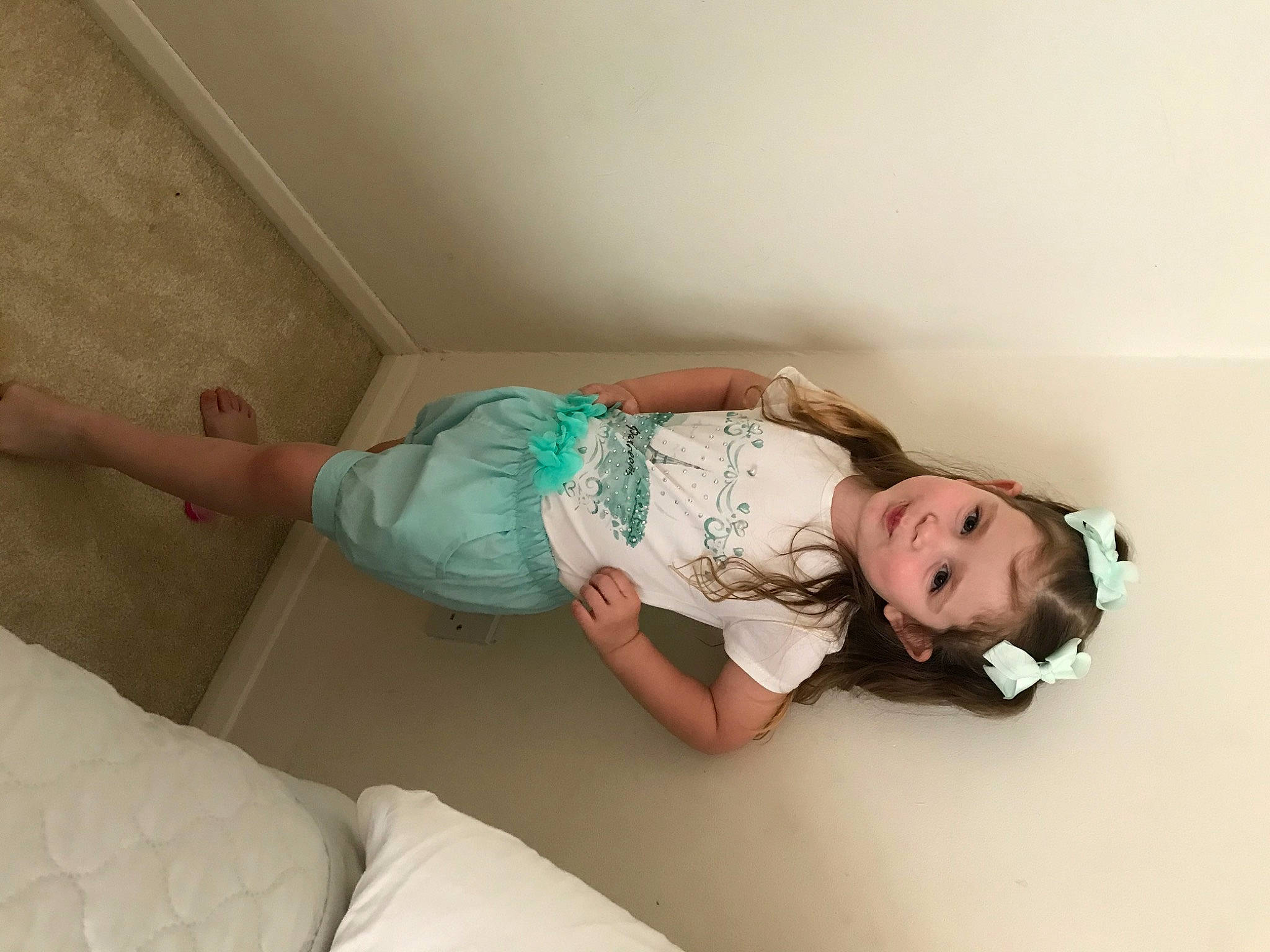 Lisa-marie joined the competition — help win amazing prizes! baby_toddler_clothing, bed, bedding, comfort, elbow, finger, floor, flooring, human_body, human_leg, knee, leg, linens, person, shorts, shoulder, skin, sock, t_shirt, thigh
