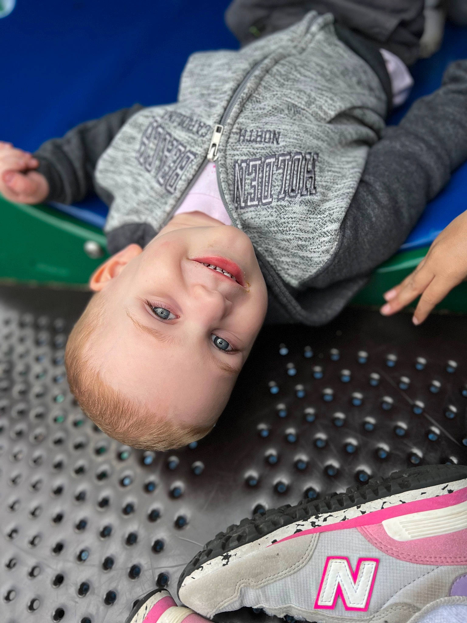 Benjimin is registered to the contest to win money with this photo: cheek, child, eye, fun, grass, happy, joy, leisure, mouth, nose, outdoor_shoe, pattern, person, photograph, product, recreation, skin, smile, snapshot, toddler