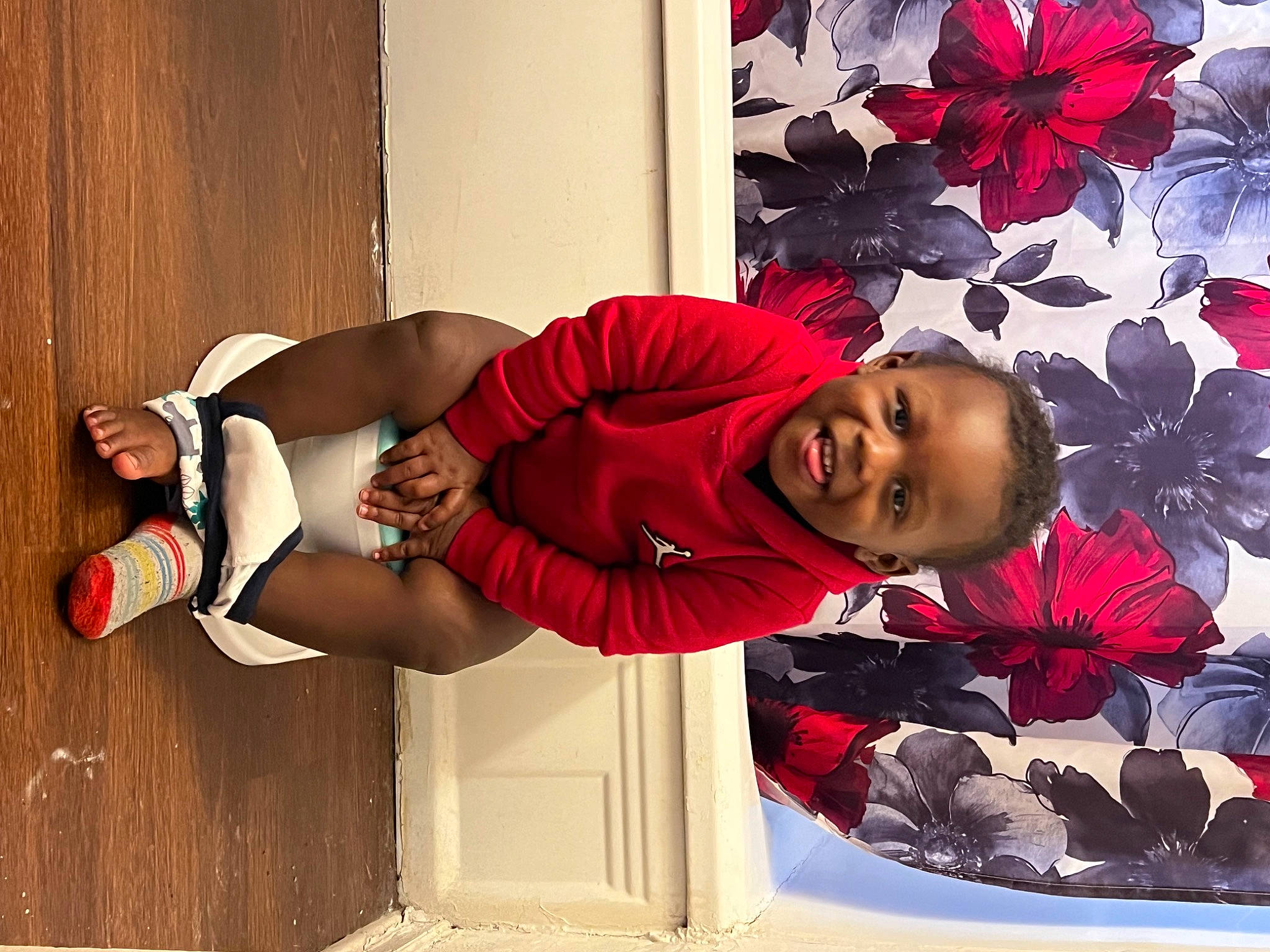 August is registered to the contest to win money with this photo: carmine, cool, happy, hat, human_leg, knee, magenta, pattern, person, petal, pink, plant, red, shorts, smile, sportswear, sunglasses, textile, thigh, waist