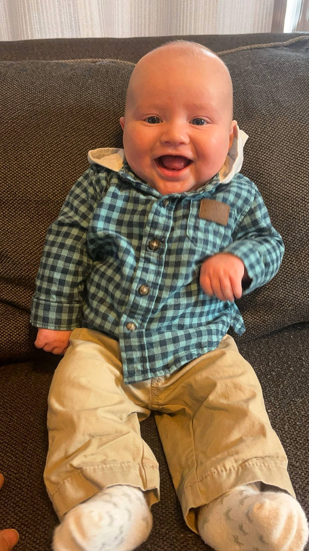 Winston joined the competition — help win amazing prizes! baby, clothing, coat, couch, cushion, face, furniture, happy, head, homedecor, jacket, jeans, laughing, pants, person, photography, portrait, shirt, shorts, sitting
