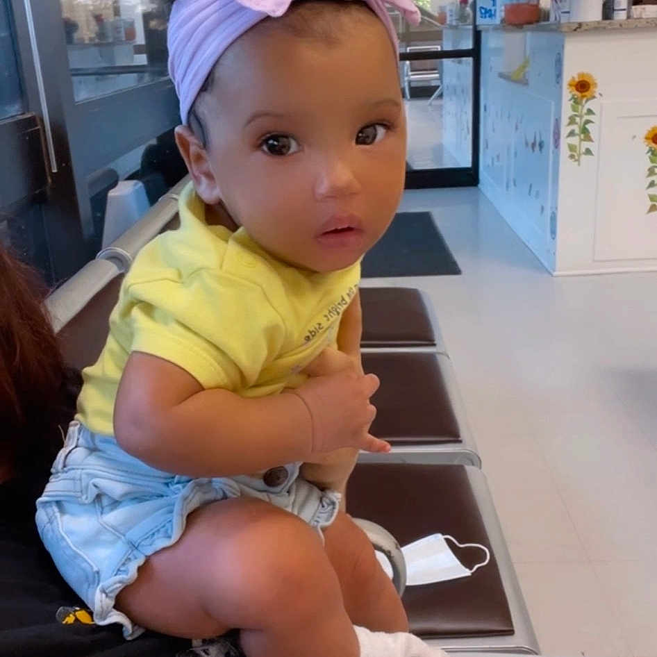 Kiyomi Sevyn joined the competition — help win amazing prizes! baby, cabinetry, cap, child, countertop, fashion_accessory, flooring, fun, hairstyle, hat, human_leg, kitchen, leisure, room, service, sitting, t_shirt, thigh, toddler, vacation