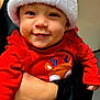 Aubriella is registered to the contest to win money with this photo: baby, child, smiling, red_clothing, santa_hat, holiday, christmas, festive, cute, portrait, indoor, person, holding, plush, toddler, face, happy, cute_outfit, reindeer, celebration
