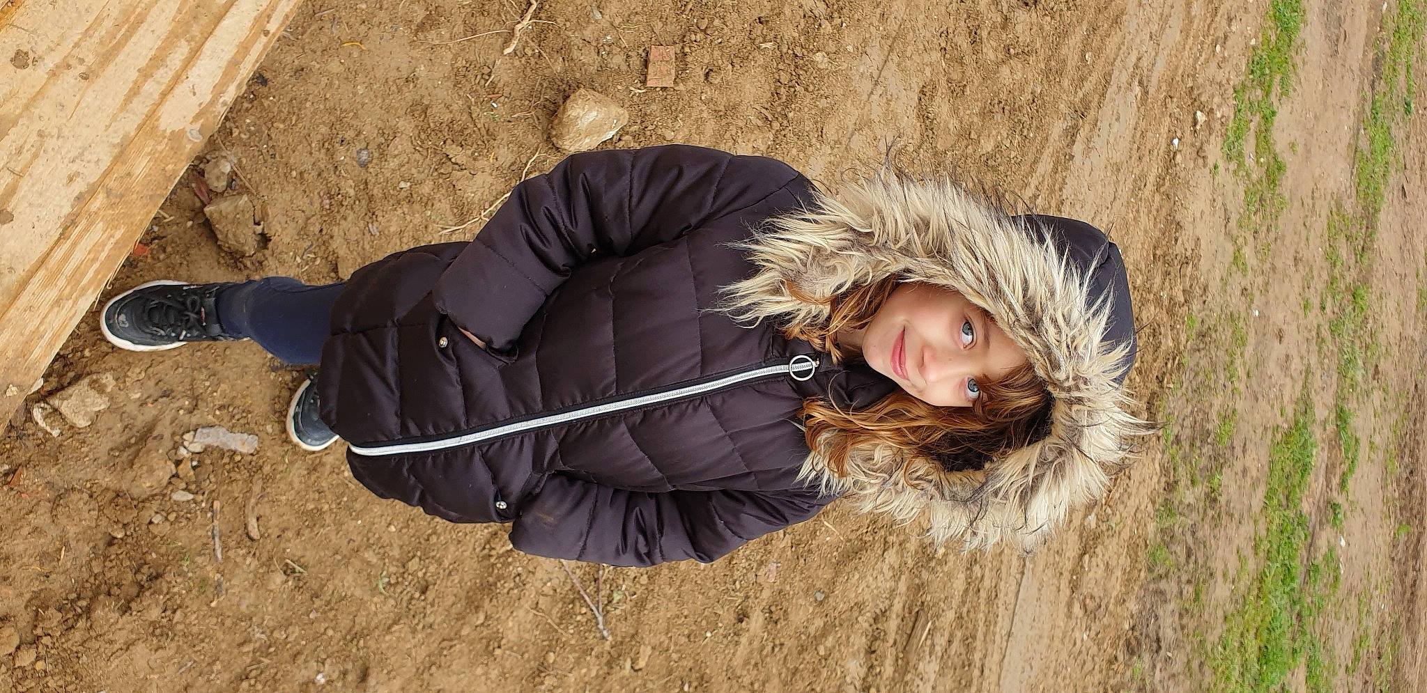 Lou participe au concours pour gagner de l'argent avec cette photo : eye, eyewear, fashion_accessory, flash_photography, fun, fur, fur_clothing, grass, happy, headwear, jacket, joy, landscape, long_hair, parka, people_in_nature, person, portrait_photography, sitting, soil