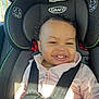Daylanna is registered to the contest to win money with this photo: accessories, baby, babylaughing, belt, car, car_interior, clothing, coat, cushion, face, happy, head, homedecor, jacket, person, photography, portrait, smile, transportation, vehicle