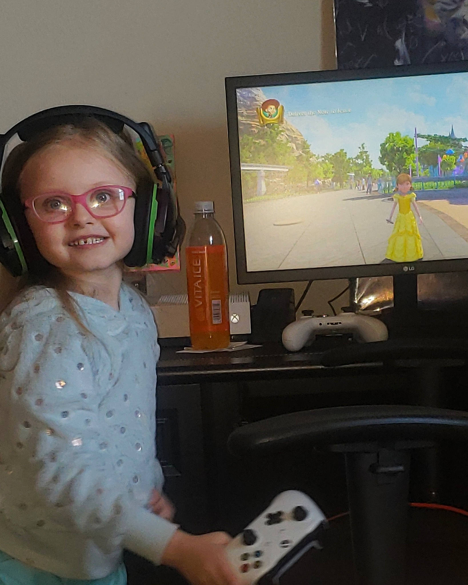 Kayleerose is registered to the contest to win money with this photo: child, computer, computer_monitor, desk, desktop_computer, display_device, electronic_device, electronics, fun, gadget, games, glasses, joy, media, person, personal_computer, room, screen, standing, technology