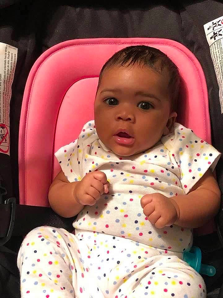 Kailee is registered to the contest to win money with this photo: baby, baby_products, baby_toddler_clothing, car_seat, cheek, child, comfort, person, pink, polka_dot, toddler