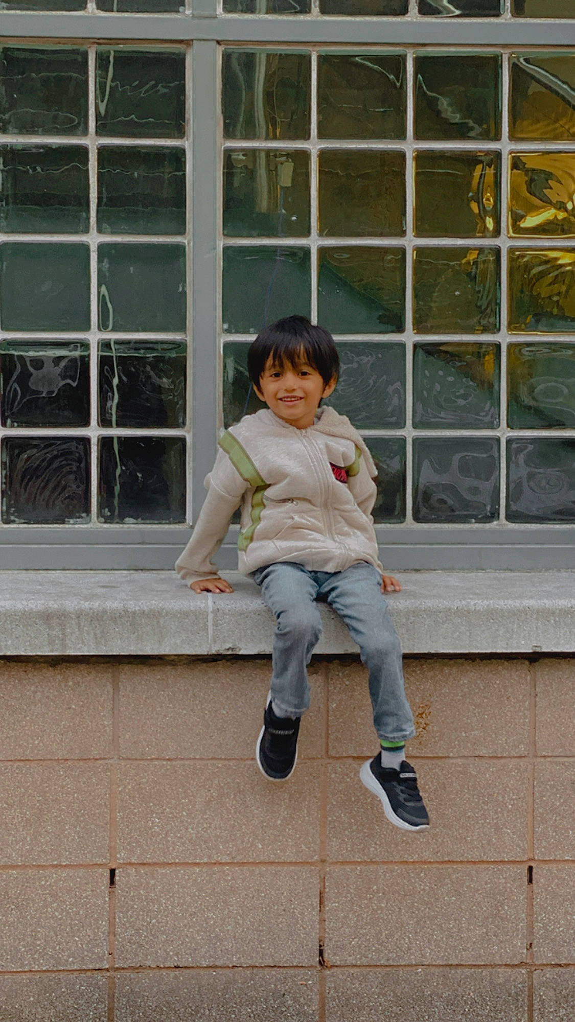 Avin is registered to the contest to win money with this photo: child, concrete, denim, fun, grey, happy, human_leg, joy, leisure, person, portrait_photography, shoe, sitting, sneakers, stairs, street_fashion, symmetry, toddler, tree, vacation