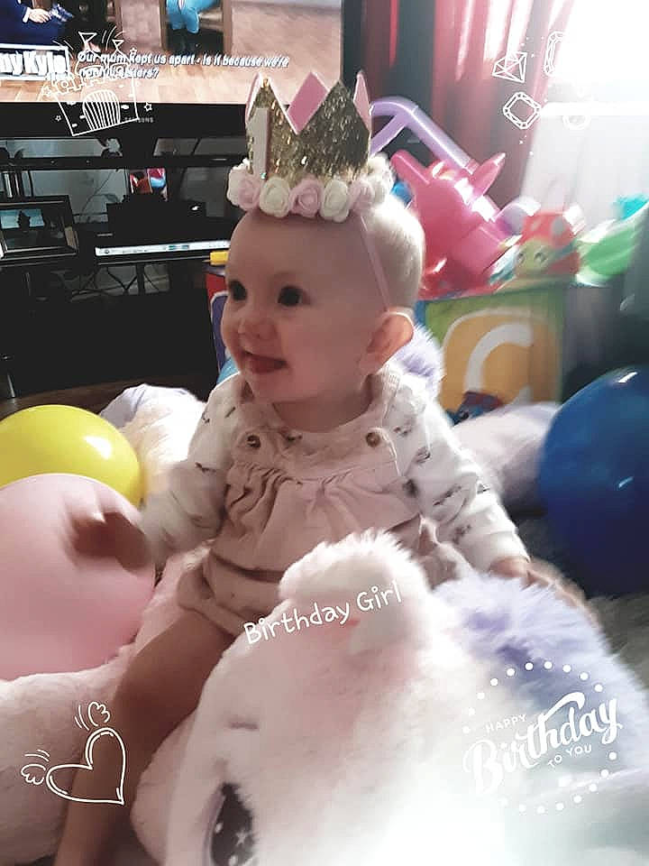 Gracie is registered to the contest to win money with this photo: baby, child, costume, ear, easter_bunny, fictional_character, fun, fur, head, person, pink, room, sitting, smile, stuffed_toy, toddler, toy