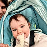 Adan a rejoint le concours — aidez-le/la à gagner de superbes lots ! baby, blanket, blue_eyes, candid, child, closeup, clothing, cute, fabric, face, hand, happy, indoor, infant, parent, person, plush_toy, smiling, stroller, young_child
