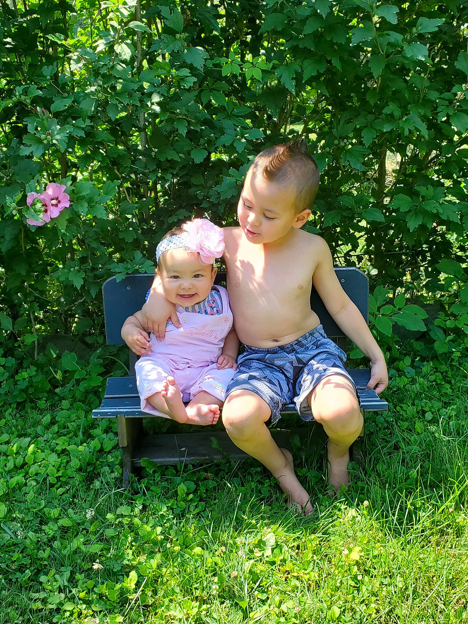Elora joined the competition — help win amazing prizes! baby, baby_toddler_clothing, barefoot, botany, child, foot, fun, garden, grass, groundcover, happy, headwear, joy, leisure, meadow, people_in_nature, person, plant, shorts, sitting