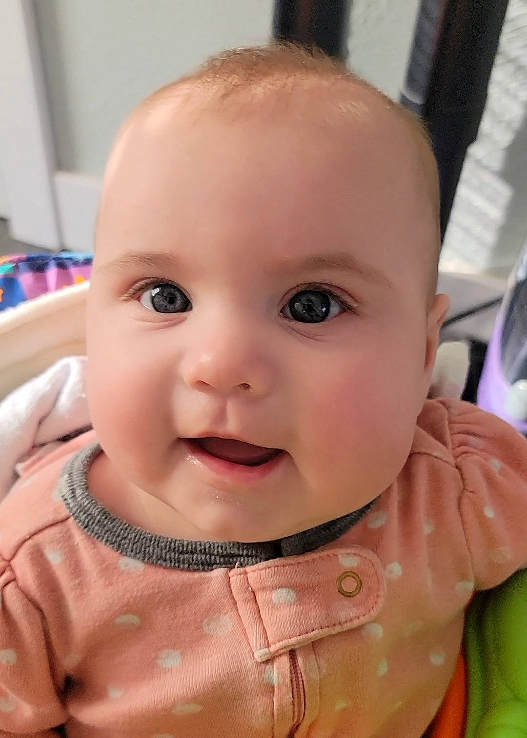 Emmalyn is registered to the contest to win money with this photo: baby, baby_toddler_clothing, cheek, chin, clothing, ear, eye, eyebrow, eyelash, forehead, iris, lip, mouth, neck, nose, person, skin, sleeve, smile, standing