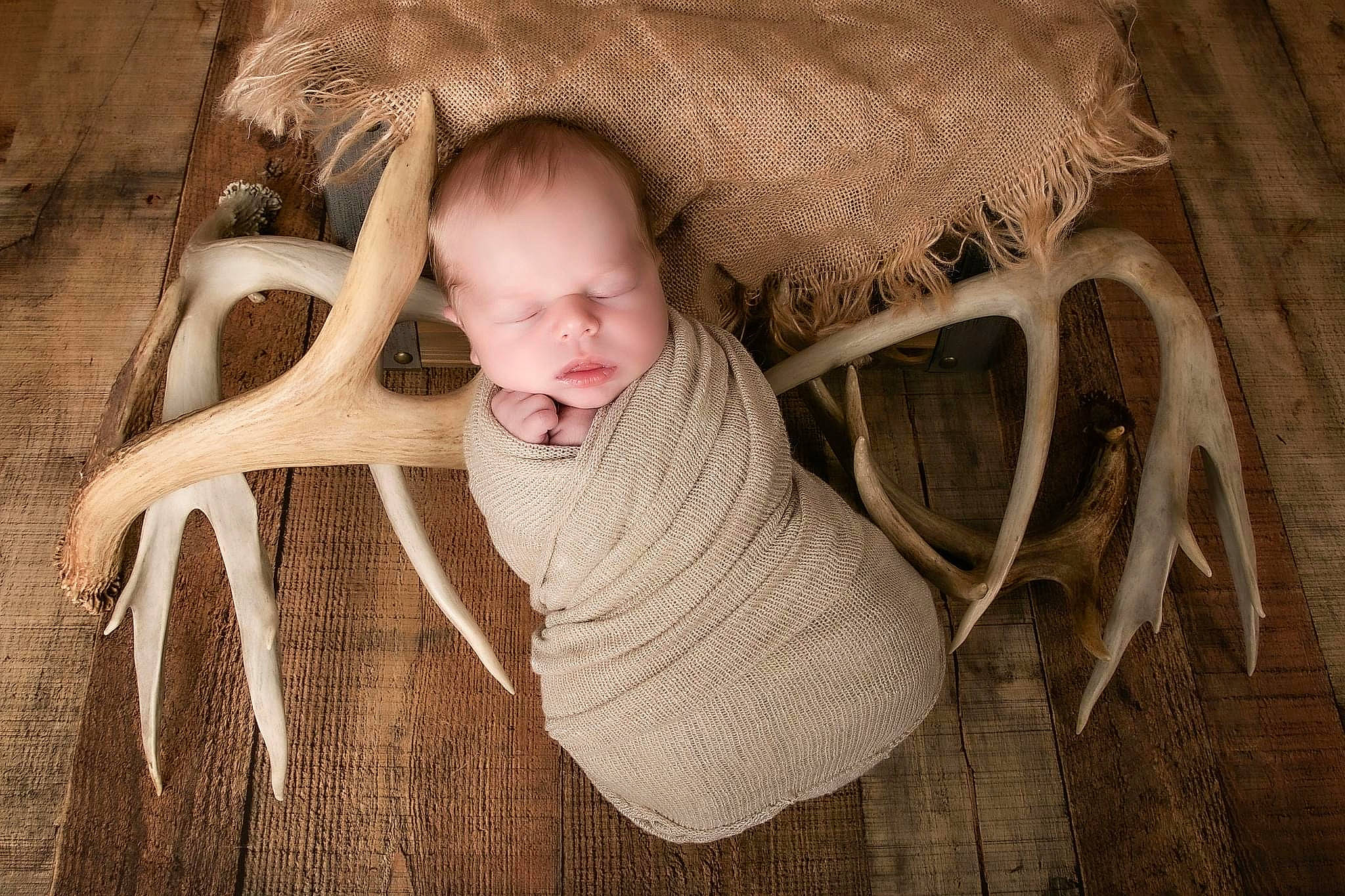 Sawyer is registered to the contest to win money with this photo: baby, baby_toddler_clothing, child, comfort, eye, facial_expression, flash_photography, floor, flooring, fur, grass, happy, hardwood, linens, monochrome, pattern, person, sitting, stock_photography, toddler