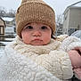 baby, child, winter, snow, hat, fleece, coat, outdoor, face, portrait, cold, knit_hat, cute, young_child, person, suburb, seasonal, winter_clothing, expressionless, bundle