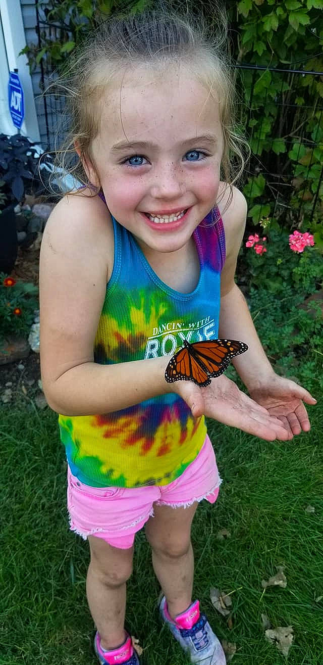 Adalie is registered to the contest to win money with this photo: brush_footed_butterfly, butterfly, caterpillar, child, emperor_moths, fawn, insect, invertebrate, joy, monarch_butterfly, moths_and_butterflies, person, plant, play, pollinator, smile, summer, toddler, vacation