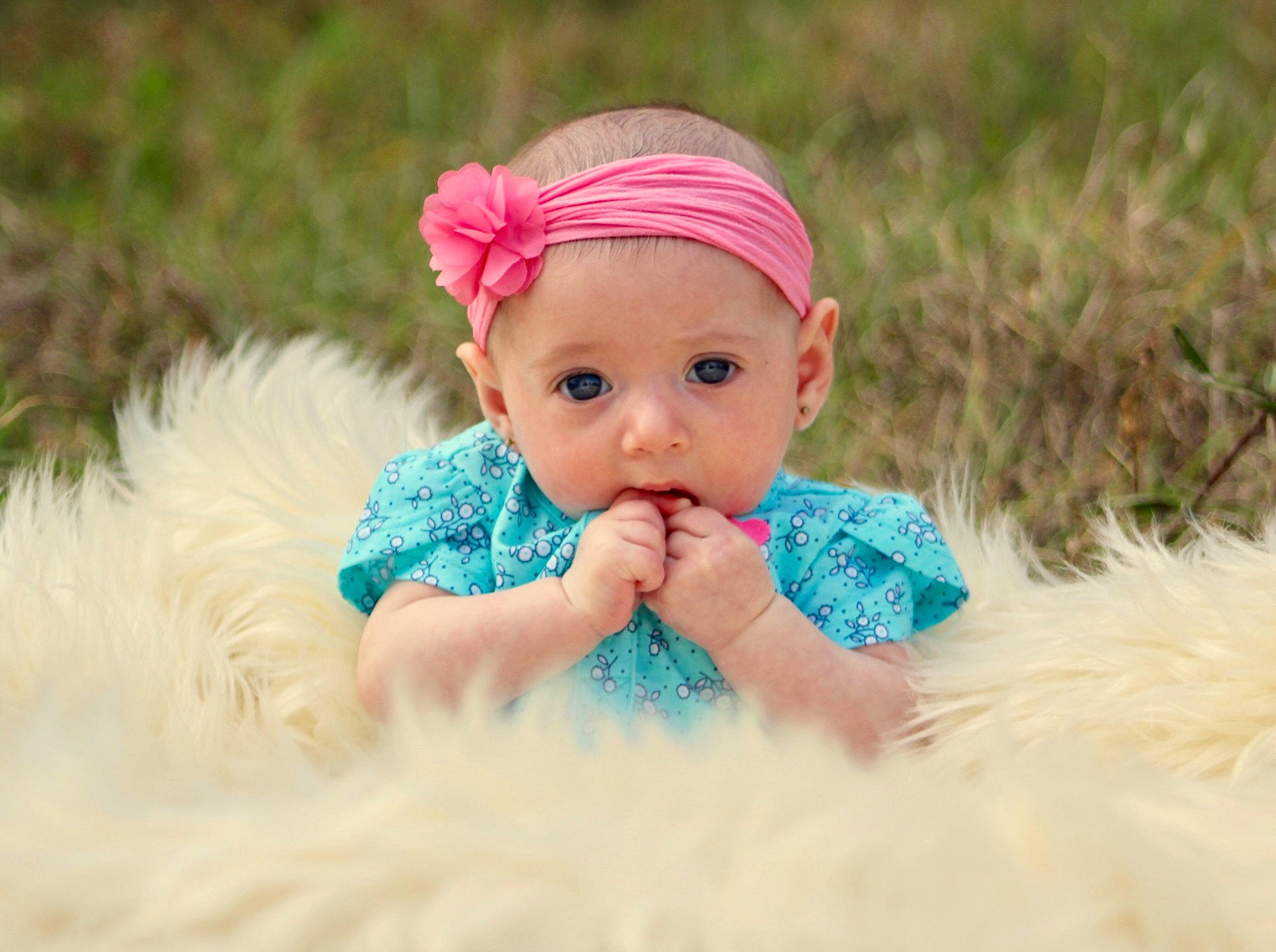 Annaliese joined the competition — help win amazing prizes! baby, baby_toddler_clothing, cheek, child, child_model, eye, fashion_accessory, fun, fur, grass, hair_accessory, head, headband, headgear, headwear, person, photography, pink, play, skin