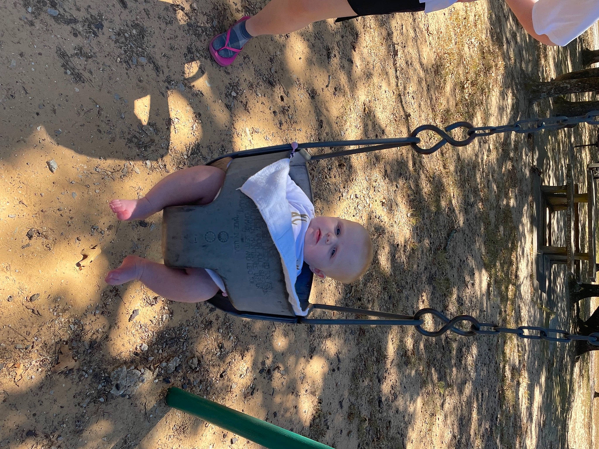 Bexley is registered to the contest to win money with this photo: beach, cool, eyewear, fun, hat, human_leg, landscape, leisure, people_in_nature, person, recreation, reflection, road_surface, sand, shadow, soil, sunlight, tints_and_shades, tree, wall