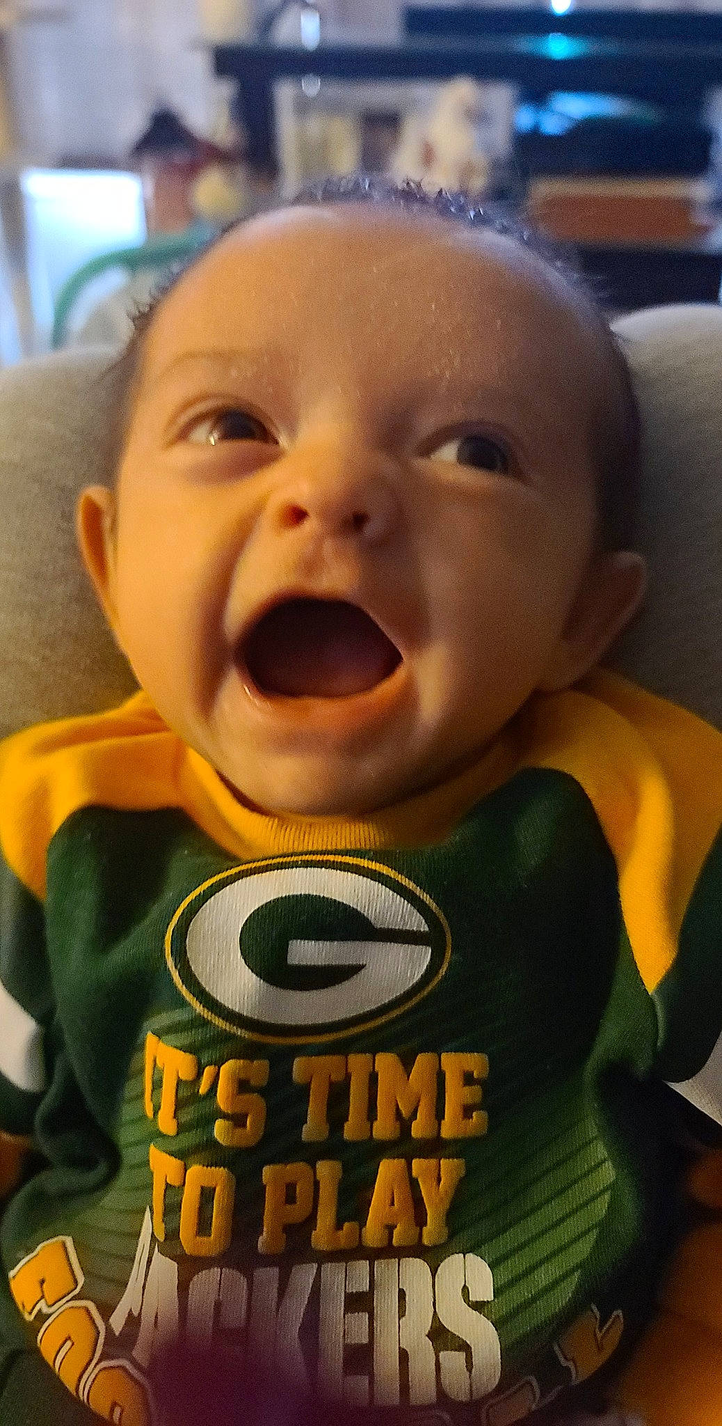 Luka joined the competition — help win amazing prizes! baby, baby_laughing, baby_making_funny_faces, baby_products, baby_toddler_clothing, bib, cheek, child, couch, eyebrow, forehead, humour, iris, laugh, lip, person, skin, toddler, tongue, tooth