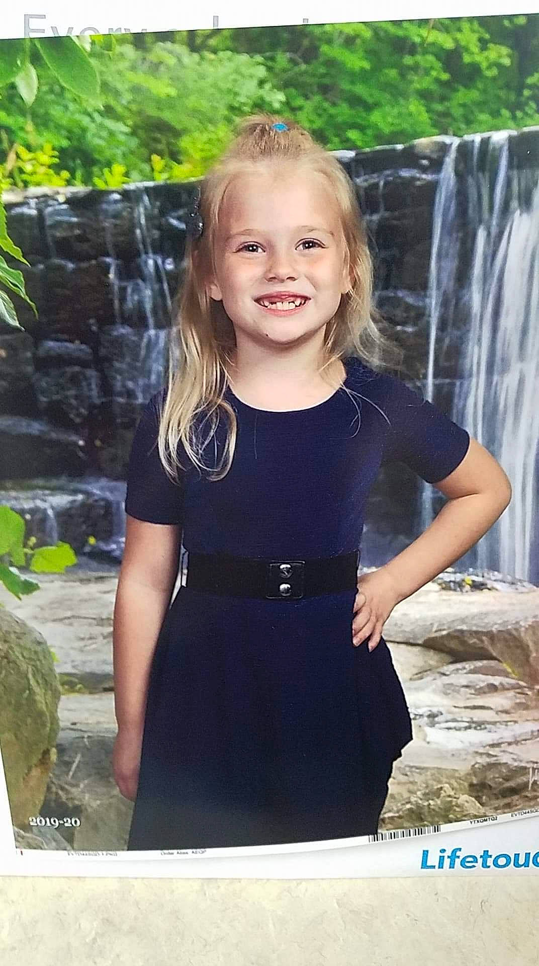 Serenity is registered to the contest to win money with this photo: child, child_model, clothing, dress, joy, person, photography, smile, t_shirt, toddler, vacation