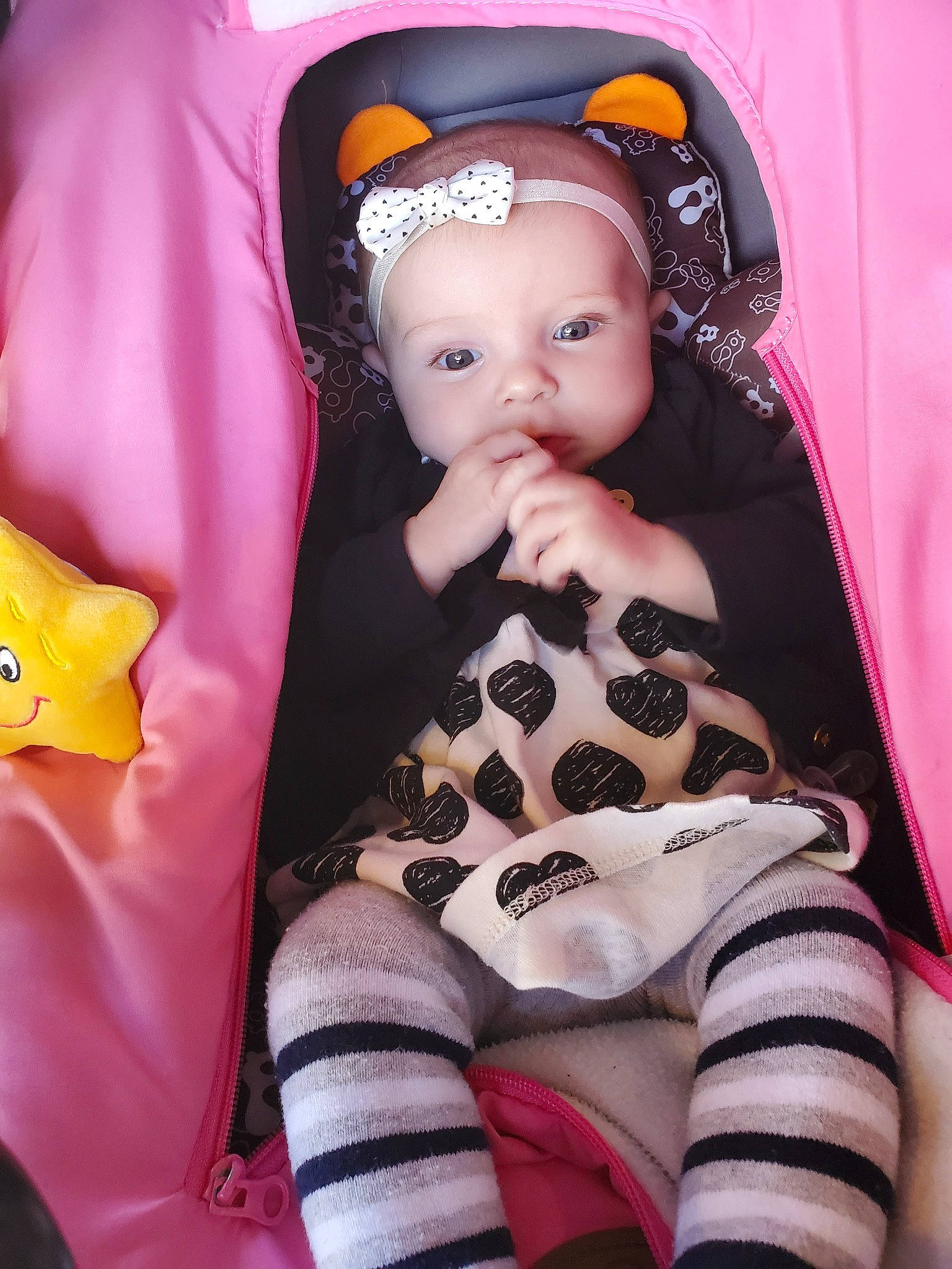 Liliana is registered to the contest to win money with this photo: baby, baby_products, baby_toys, car_seat, cheek, child, doll, ear, eye, head, iris, person, pink, product, skin, toddler, toy