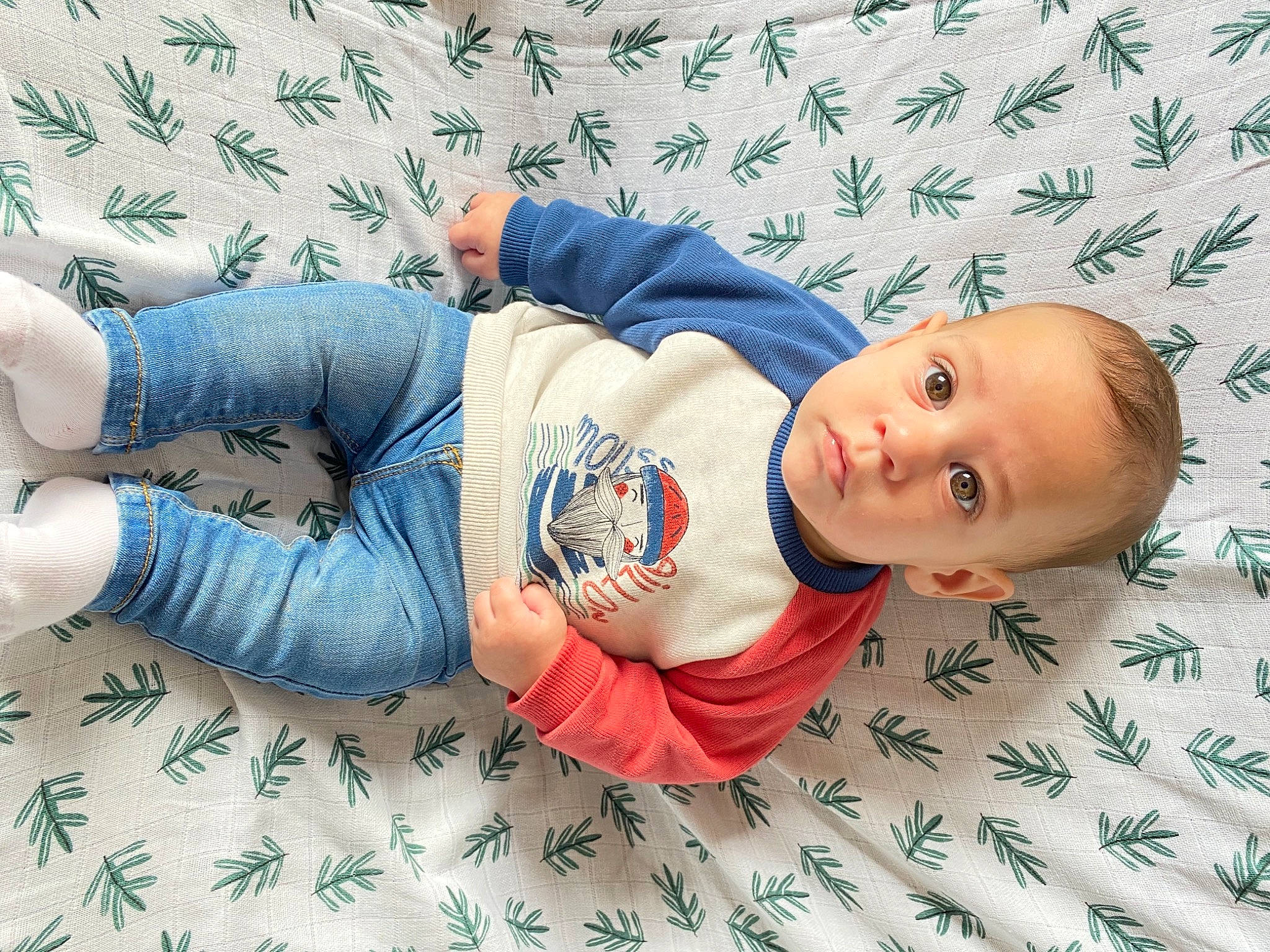 Eden participe au concours pour gagner de l'argent avec cette photo : arm, baby, baby_sleeping, baby_toddler_clothing, child, comfort, elbow, electric_blue, finger, font, happy, human_body, linens, pattern, person, product, skin, sleeve, textile, toddler