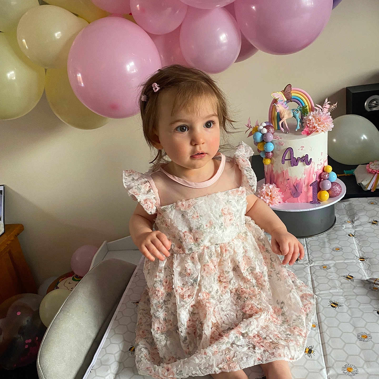 Ava joined the competition — help win amazing prizes! baby, balloon, birthdaycake, birthdayparty, cake, clothing, cream, dessert, dress, face, food, fun, head, icing, party, people, person, photography, portrait, sitting