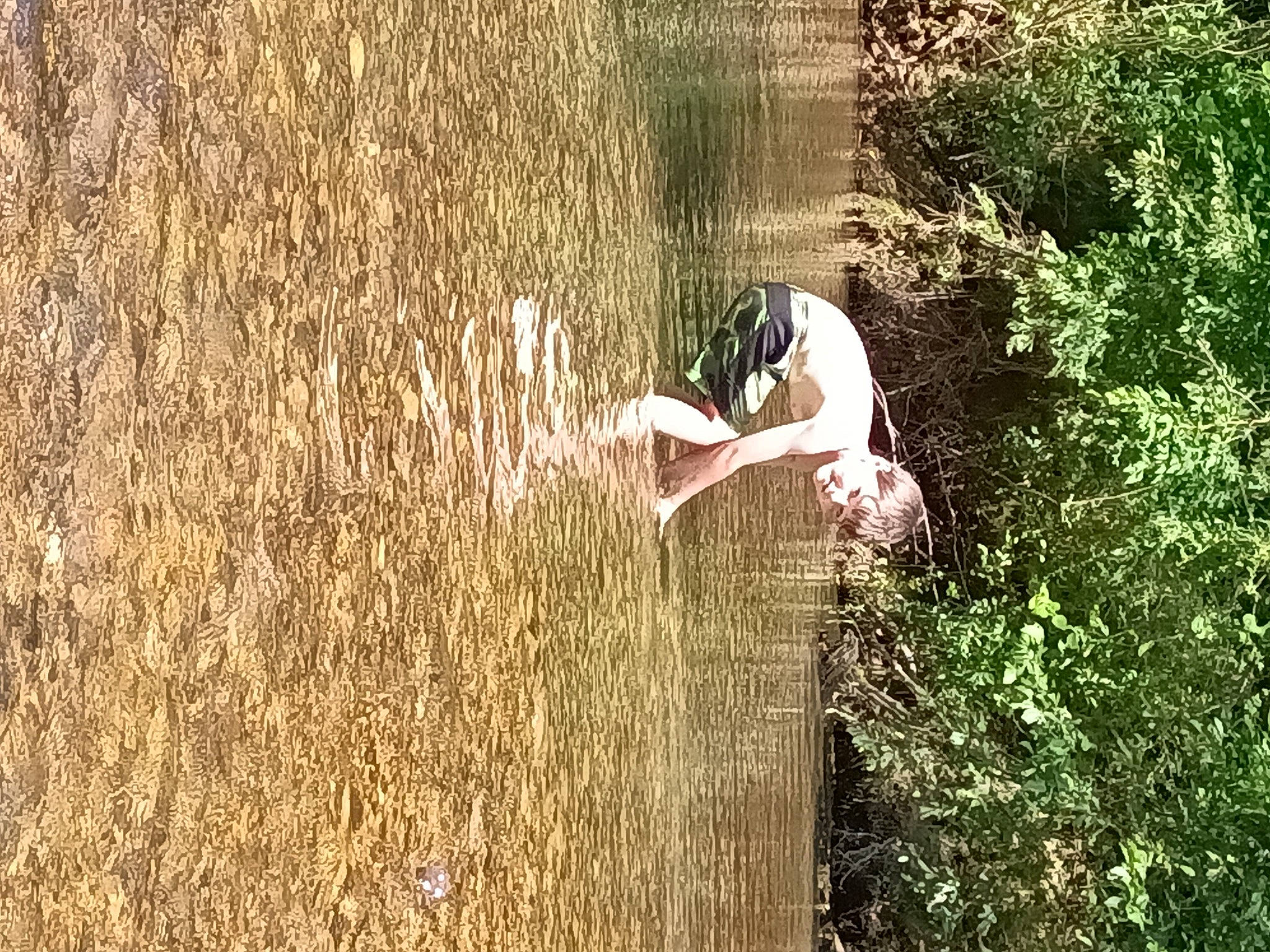 Dalton is registered to the contest to win money with this photo: agriculture, crop, field, grass, grassland, happy, landscape, leisure, meadow, natural_landscape, people_in_nature, person, plant, prairie, reflection, rural_area, soil, tree, wetland, wildlife