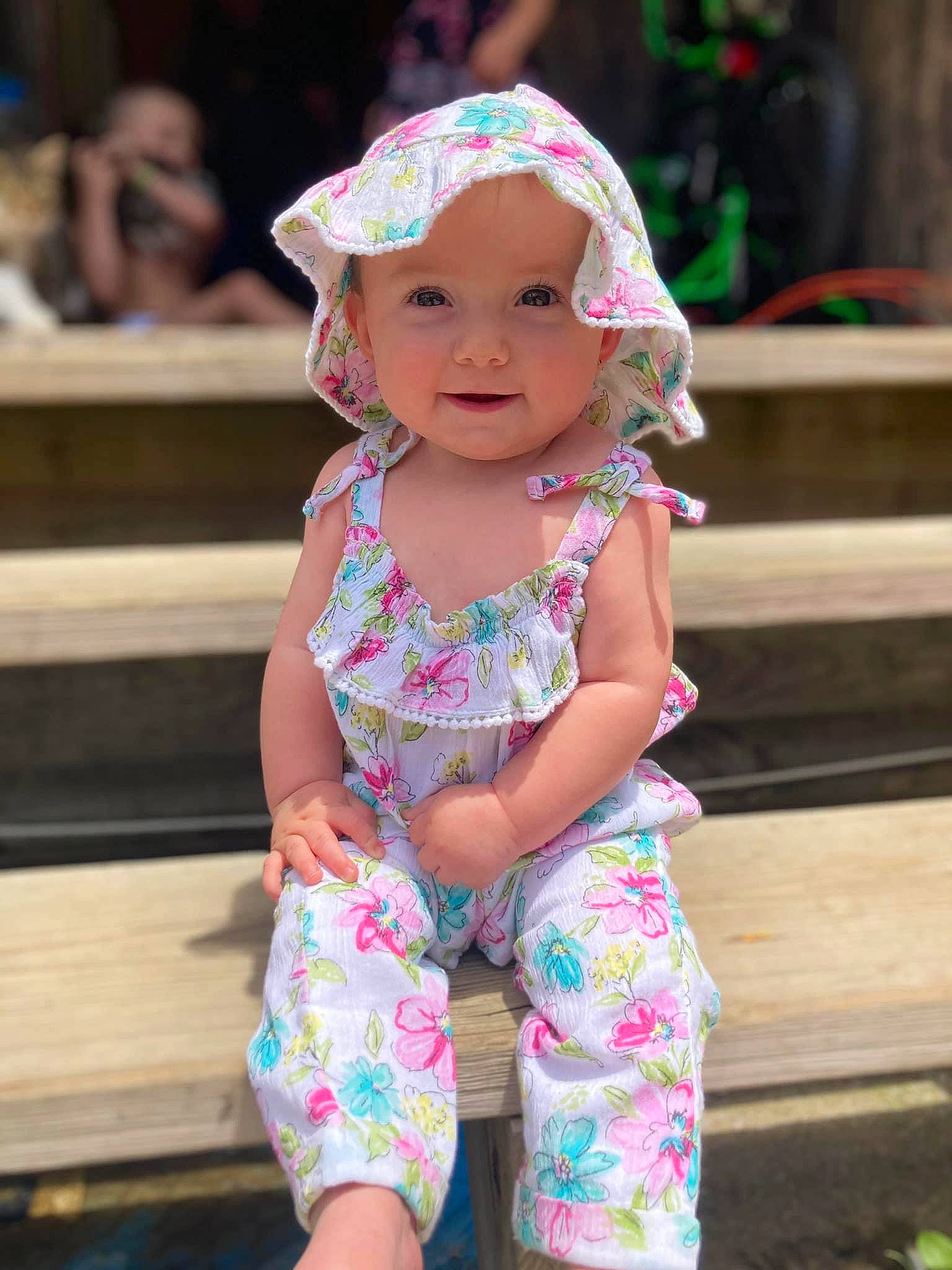 Zayley is registered to the contest to win money with this photo: baby, baby_toddler_clothing, beauty, child, eye, face, fun, grass, happy, head, headgear, headwear, leisure, magenta, person, photograph, pink, skin, sleeve, smile