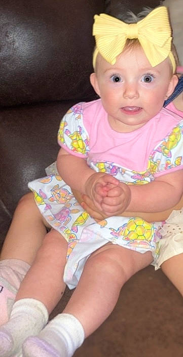 Zayley joined the competition — help win amazing prizes! baby_toddler_clothing, cap, cheek, eye, facial_expression, happy, head, headwear, human_body, iris, leg, lip, mouth, organ, person, pink, skin, stomach, textile, thigh